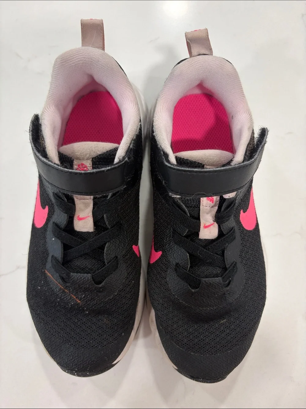 Nike Kids Black Sneakers with Pink Swoosh